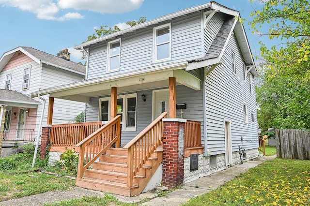 1366 Oakwood Ave, Columbus, OH 43206 - view of front facade featuring covered porch and a shingled roof
