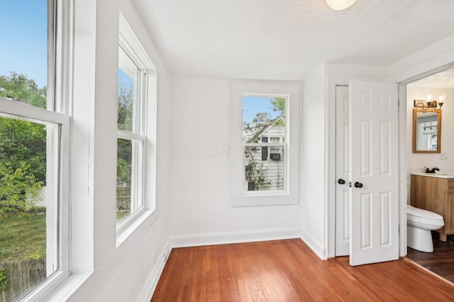 interior space with sink and a chandelier