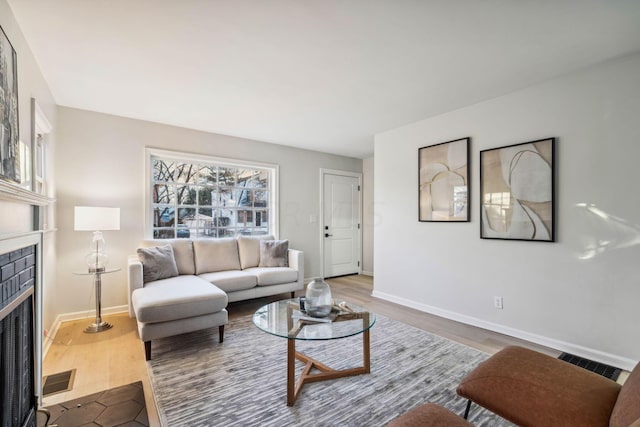 living room with wood-type flooring