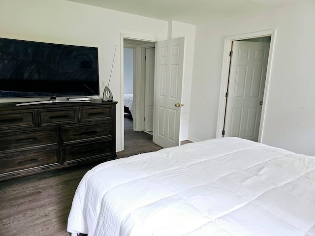 bedroom featuring dark hardwood / wood-style floors