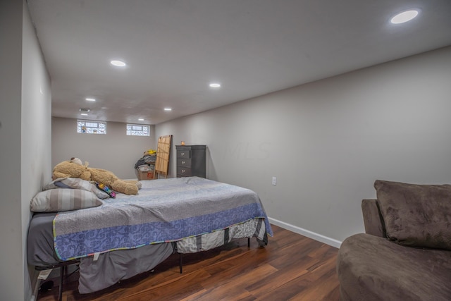 bedroom featuring dark wood-type flooring