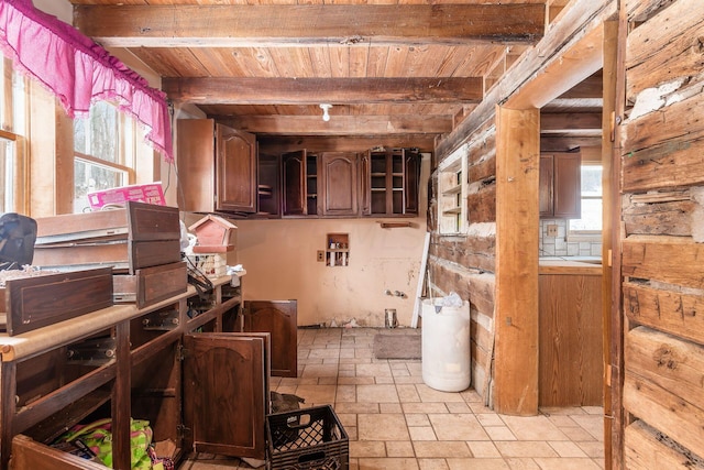 interior space featuring beam ceiling