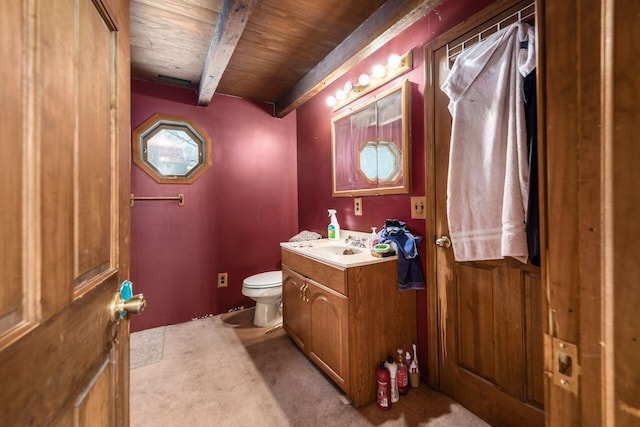 bathroom with vanity, beam ceiling, toilet, and wood ceiling