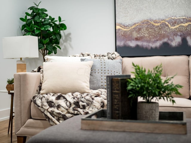 sitting room with hardwood / wood-style floors