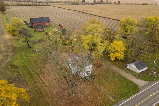 birds eye view of property with a rural view