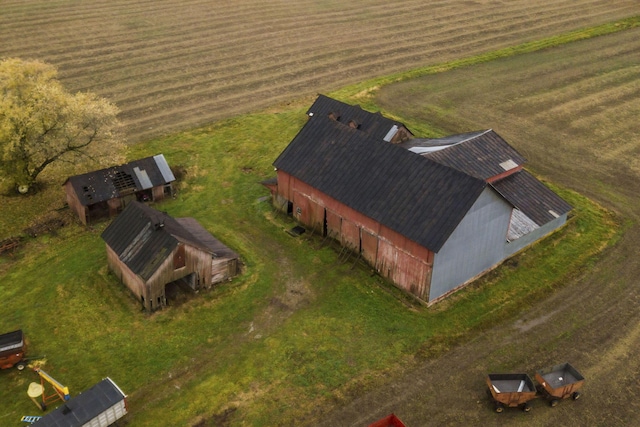 birds eye view of property featuring a rural view