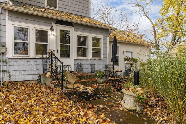 doorway to property with a patio area