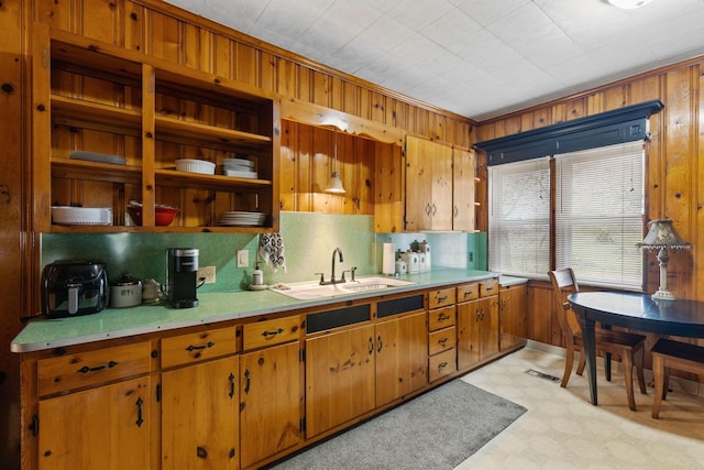 kitchen with tasteful backsplash and sink