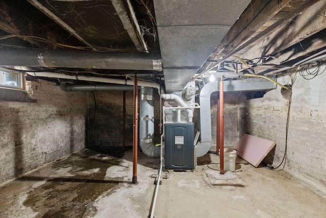 basement featuring heating unit