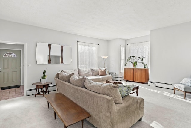 carpeted living room featuring a textured ceiling and a baseboard heating unit