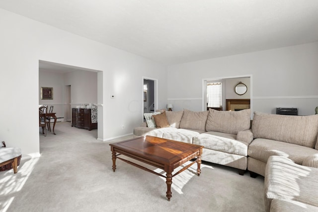 living room featuring light colored carpet