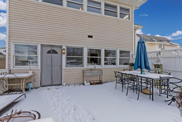 view of snow covered property