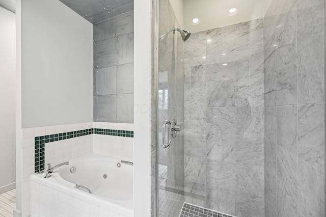 full bath with a shower stall and a tub with jets