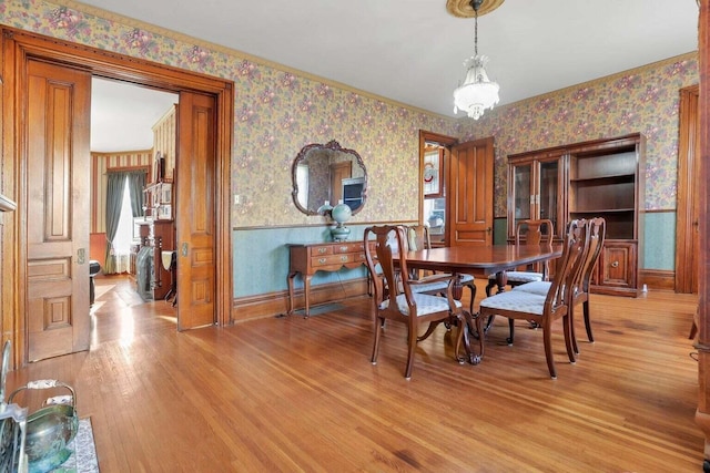 dining area with light hardwood / wood-style flooring