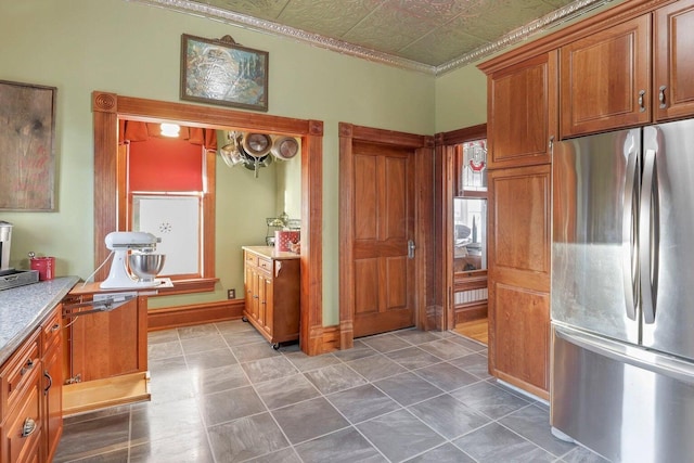 kitchen featuring stainless steel refrigerator