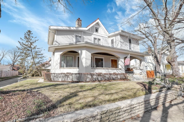 view of front facade featuring a front yard