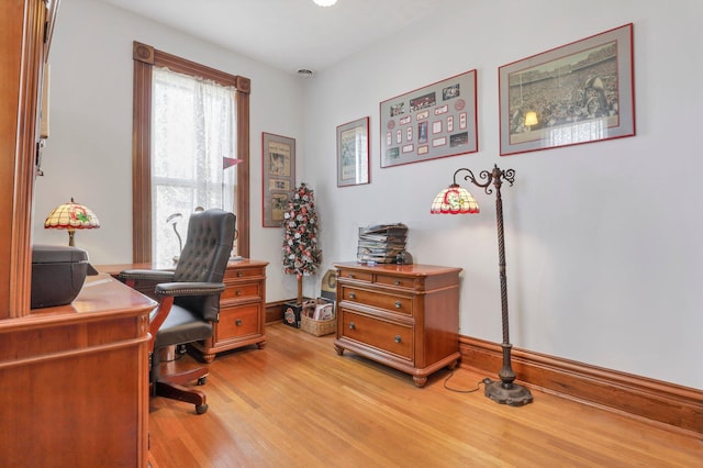 home office featuring light hardwood / wood-style flooring