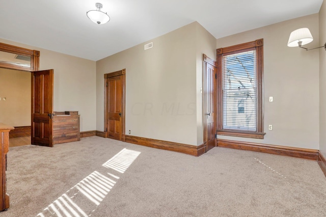 unfurnished bedroom featuring carpet floors