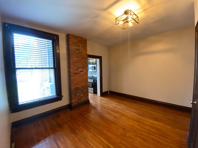 empty room featuring hardwood / wood-style floors