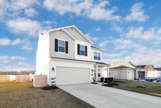 front facade featuring a front lawn and a garage