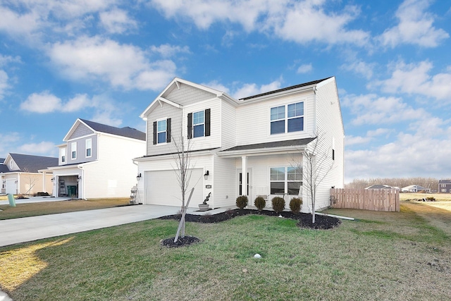 view of front of house with a garage and a front yard