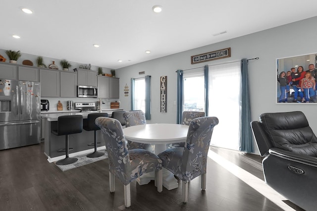 dining room featuring dark wood-type flooring