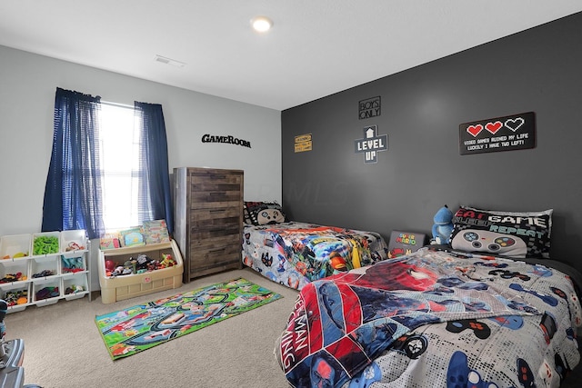 bedroom featuring carpet