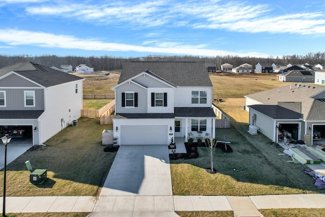 view of front facade with central air condition unit, a front lawn, and a garage