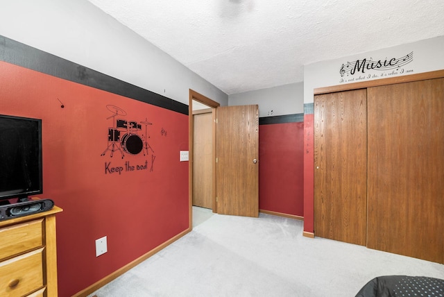 interior space featuring a closet and a textured ceiling