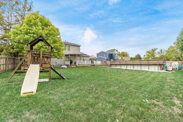 view of yard with a playground