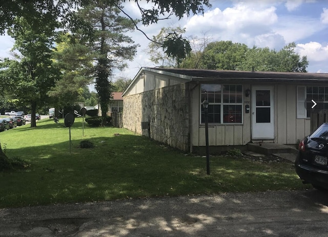 exterior space with a yard