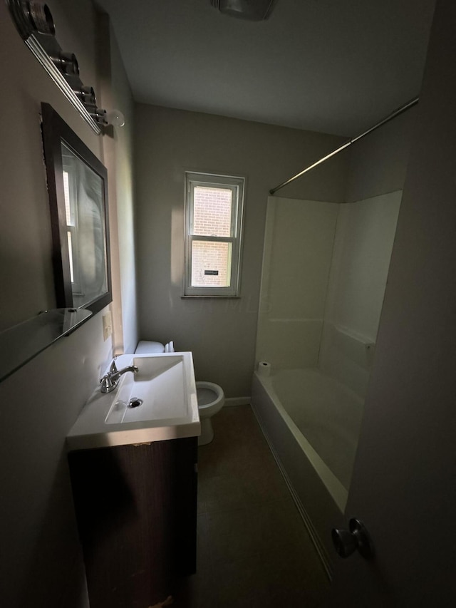 full bathroom with vanity, shower / bathtub combination, and toilet