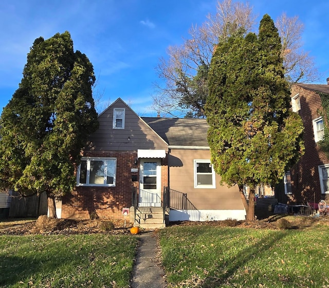 view of front of home with a front yard