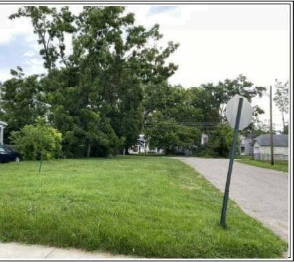 view of community featuring a yard