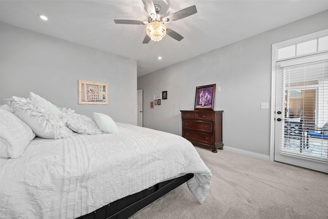 carpeted bedroom featuring access to outside and ceiling fan