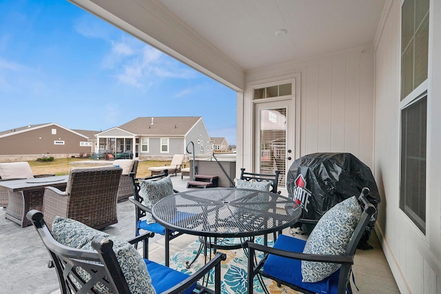 exterior space with a grill and a hot tub