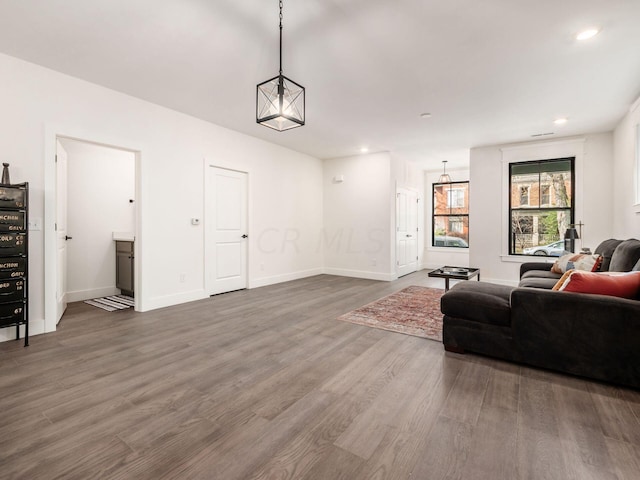 living room featuring dark hardwood / wood-style floors