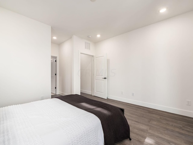 bedroom featuring hardwood / wood-style flooring