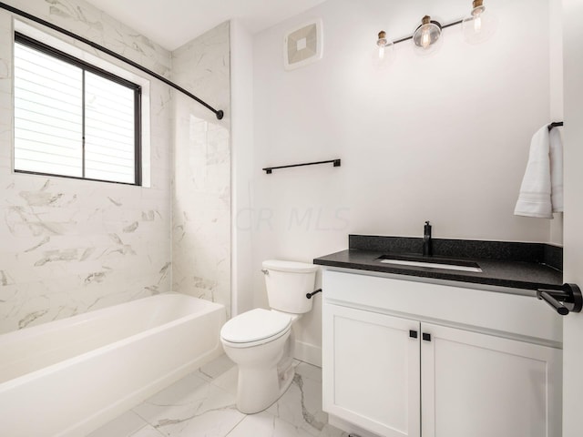 full bathroom featuring toilet, vanity, and tiled shower / bath combo