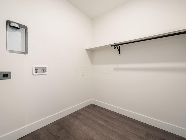 laundry room with hookup for a washing machine, dark hardwood / wood-style flooring, and electric dryer hookup