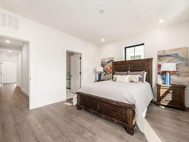 bedroom featuring light hardwood / wood-style flooring