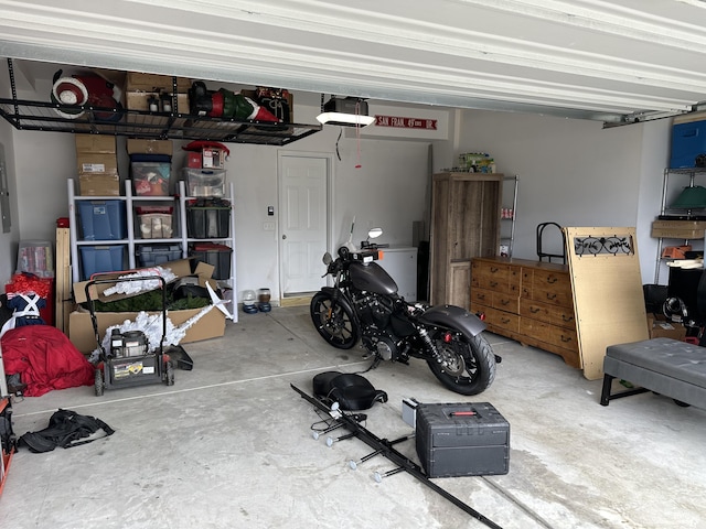 garage featuring a garage door opener