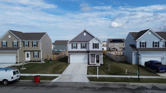 front facade with a front lawn and a garage