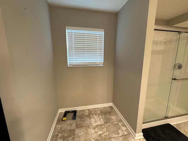 bathroom featuring walk in shower