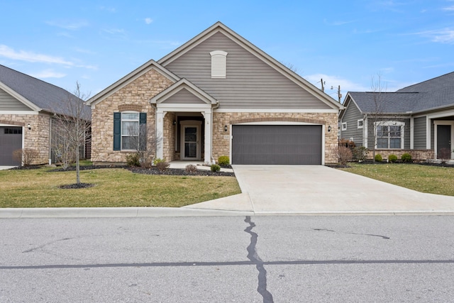 view of front facade featuring a garage and a front yard