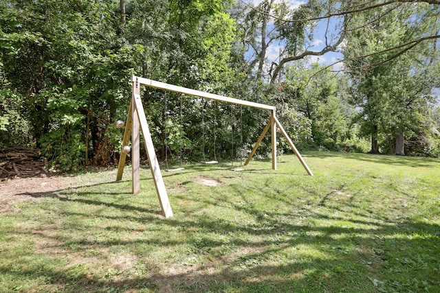 view of jungle gym with a yard