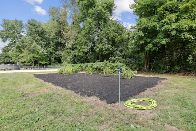 surrounding community featuring a lawn