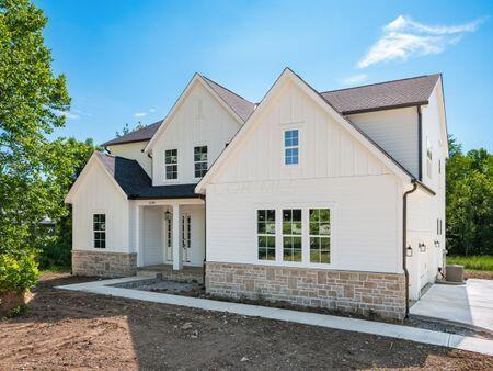 modern farmhouse featuring a porch