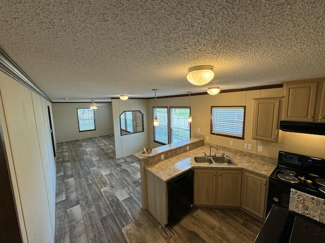 kitchen featuring ceiling fan, sink, dark hardwood / wood-style floors, kitchen peninsula, and black appliances