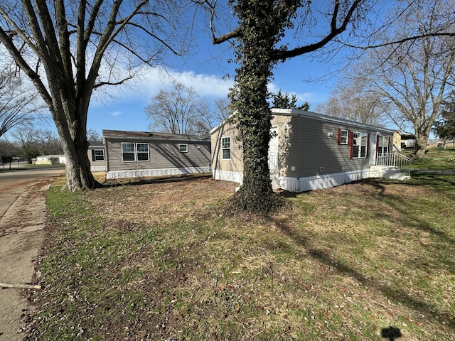 view of front of home with a front yard